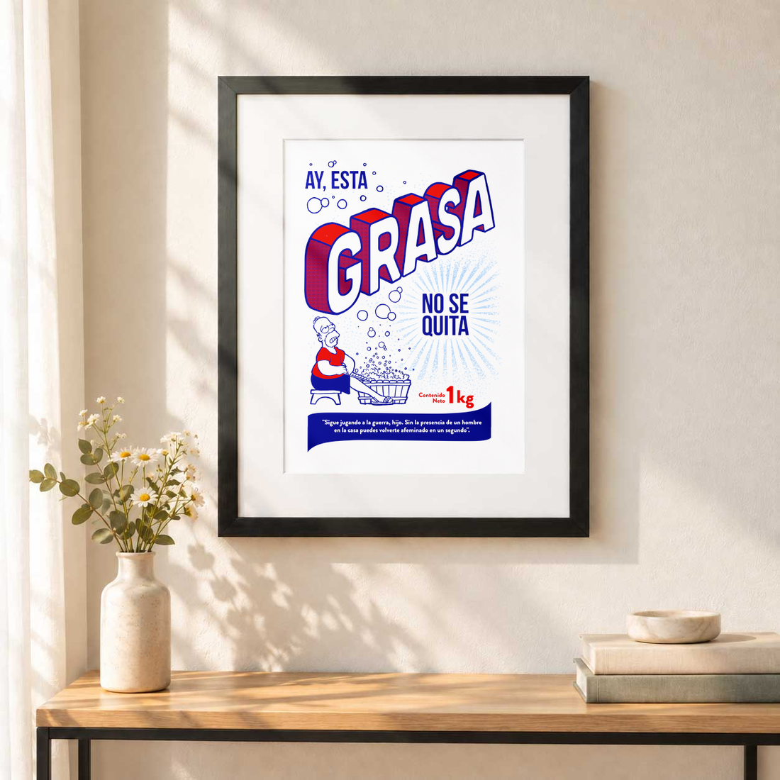 Ay esta grasa — @SimpsonitoMX con paspartú blanco, colgado en una pared.