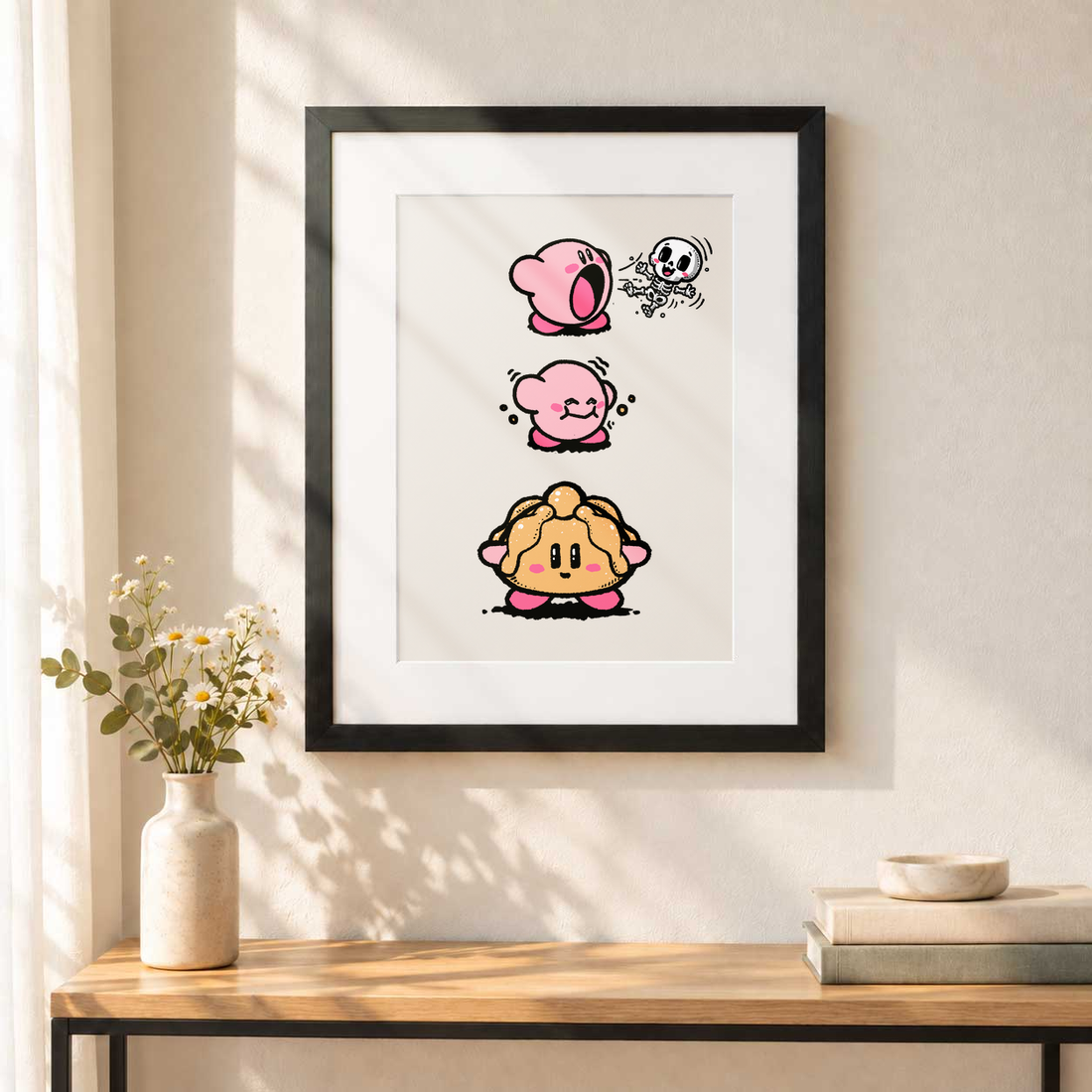 Pan de Muerto Kirby vertical con paspartú blanco, colgado en una pared.